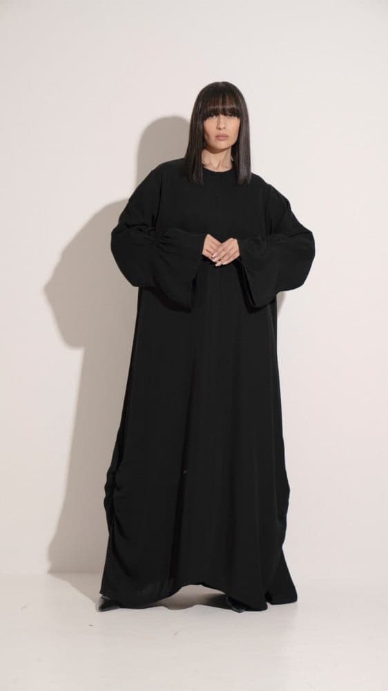 عباية بمطاط زم على الجوانب والاكمام