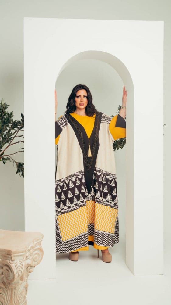 جلابية بلون اصفر وبيج