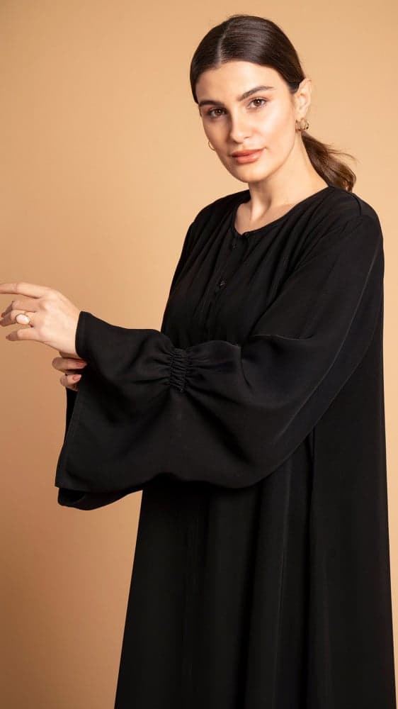 عباية بمطاط زم على الجوانب والاكمام