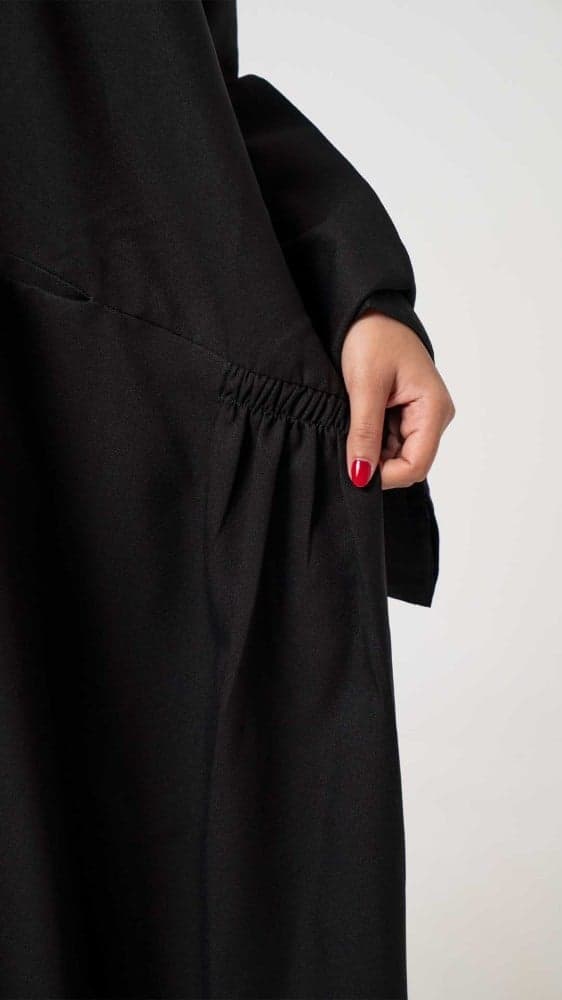 عباية فضفاضه بجيوب أماميه