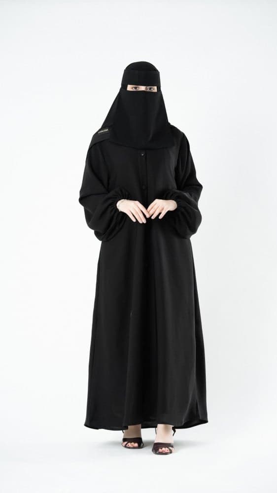 عبايه تقفل بأزرة قماش و كم مطاط