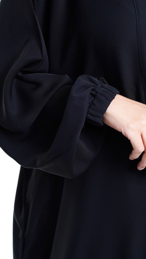 عباية ساده باكمام مطاط وجيوب مخفية