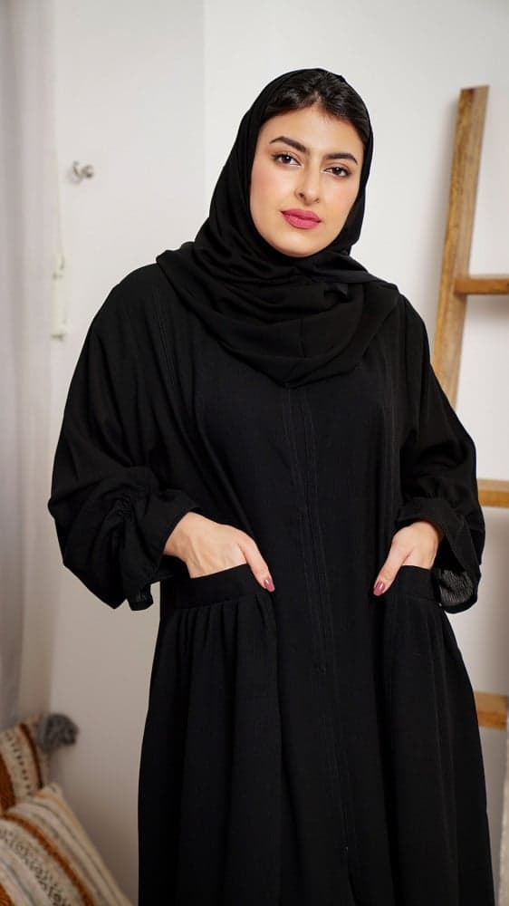 عبايه كم مطاط و بجيوب أمامية