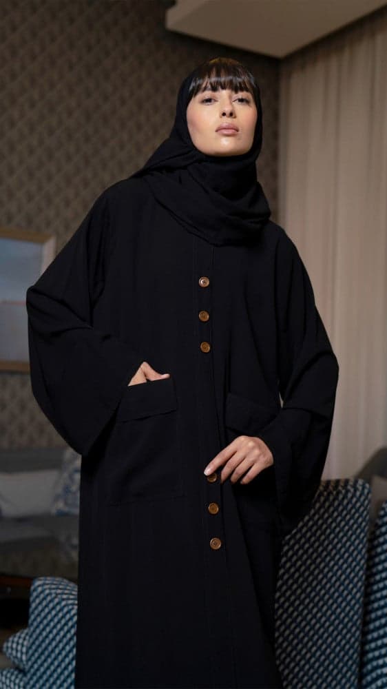 عباية جيوب وتغلق بازرة بلون نحاسي