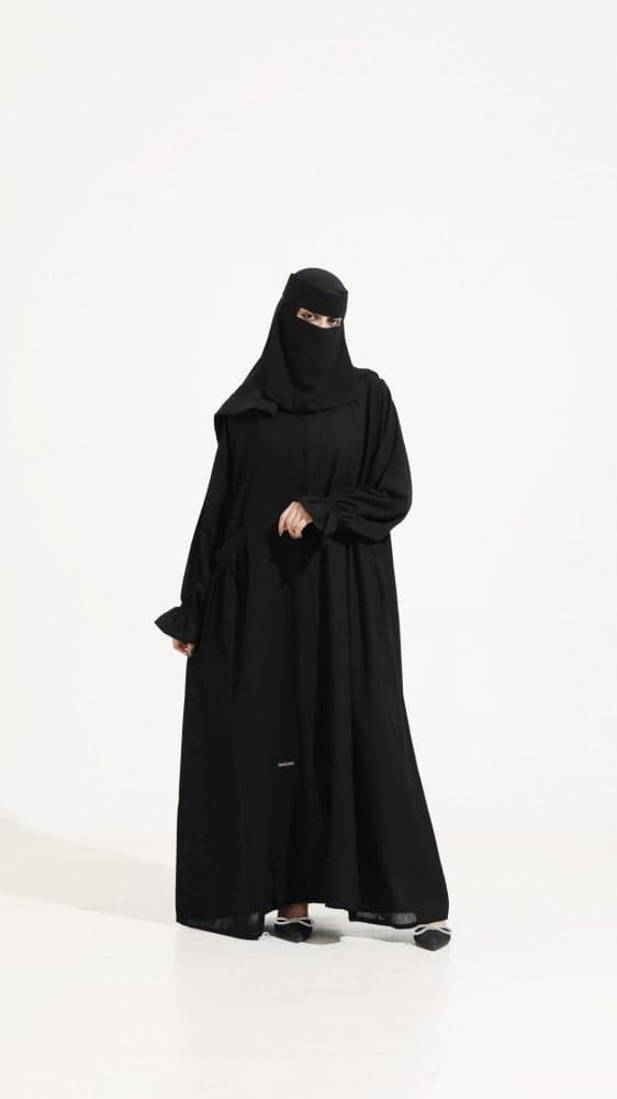 عبايه كم مطاط و بجيوب أمامية