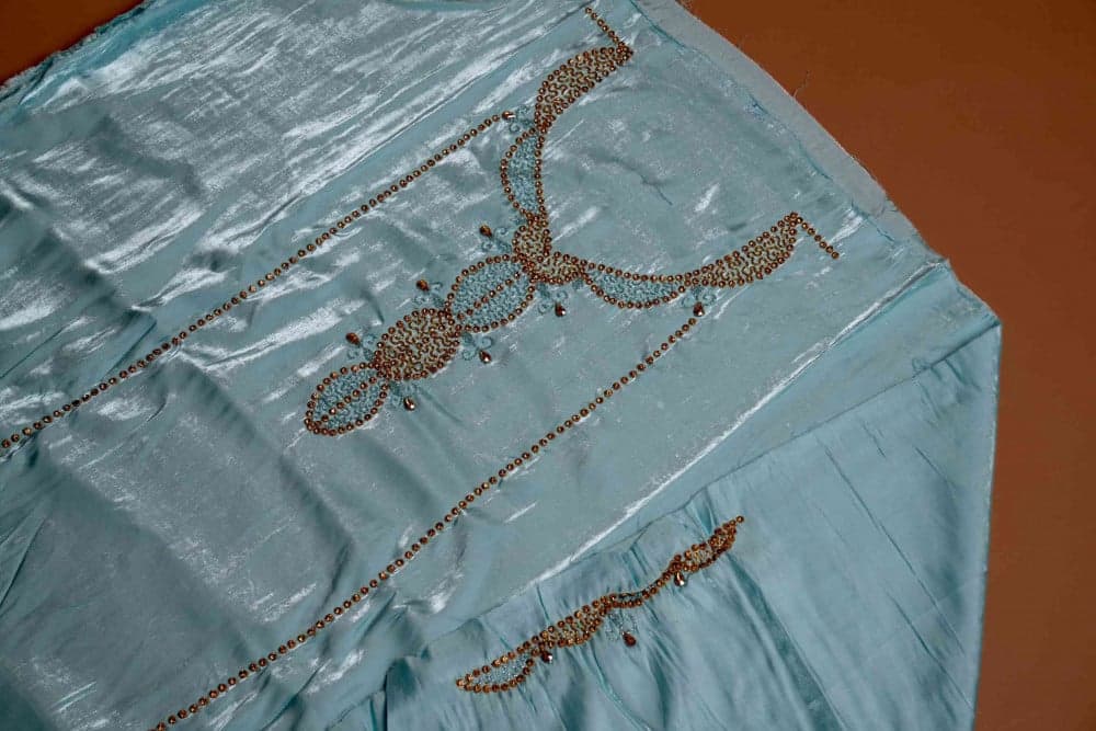 مخور بلون سماوي مطرز بذهبي