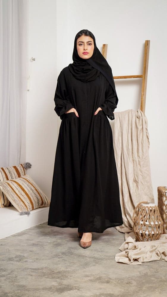 عبايه كم مطاط و بجيوب أمامية