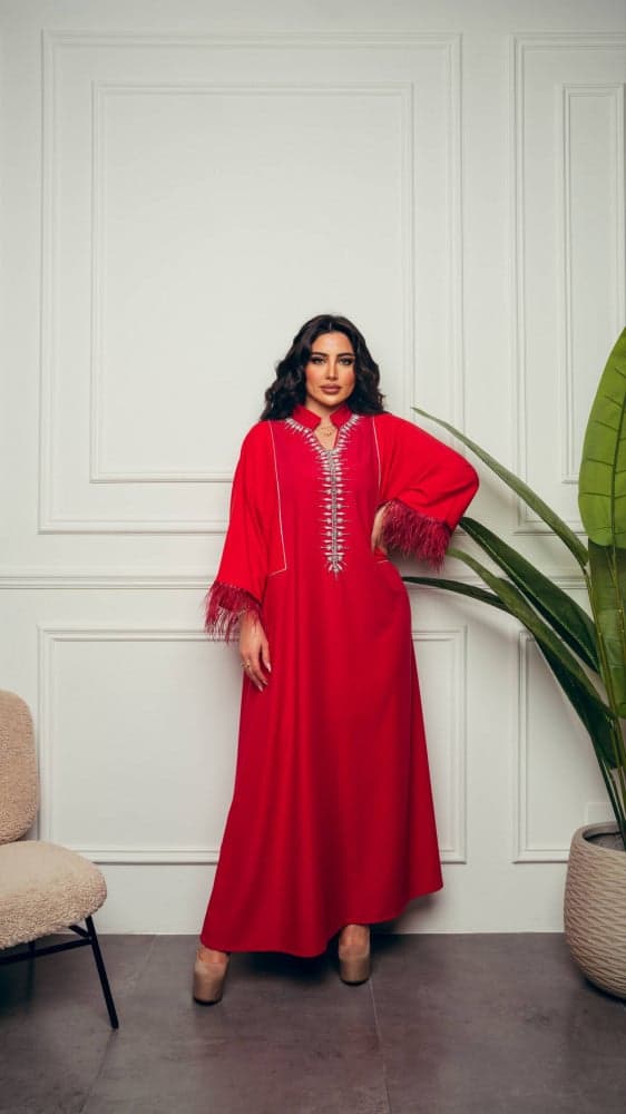 جلابية حمراء باكمام ريش