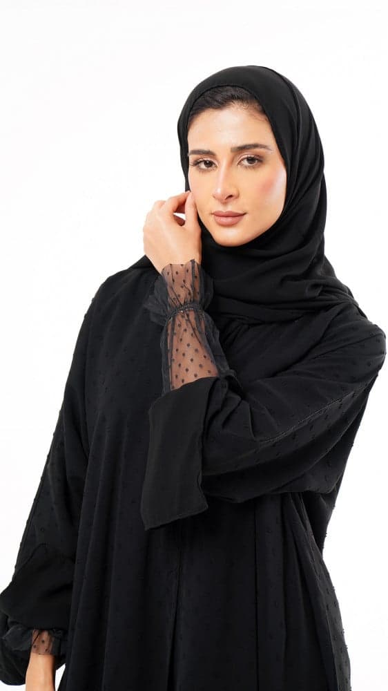عباية بخامة منقطه واكمام تل زم