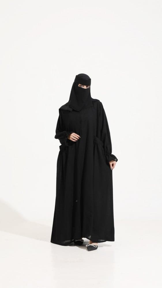 عبايه كم مطاط و بجيوب أمامية