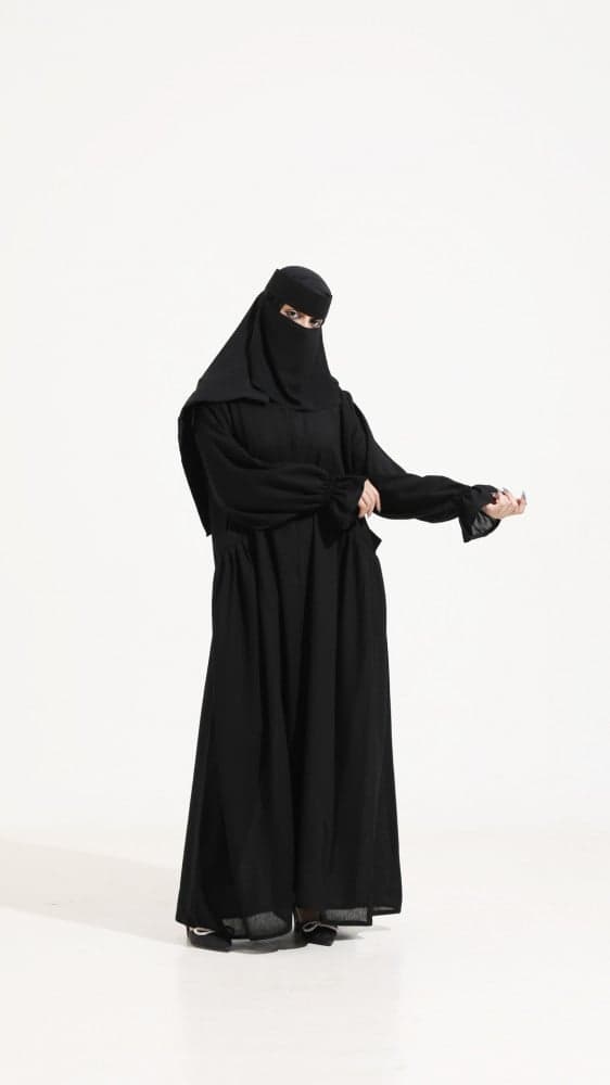 عبايه كم مطاط و بجيوب أمامية