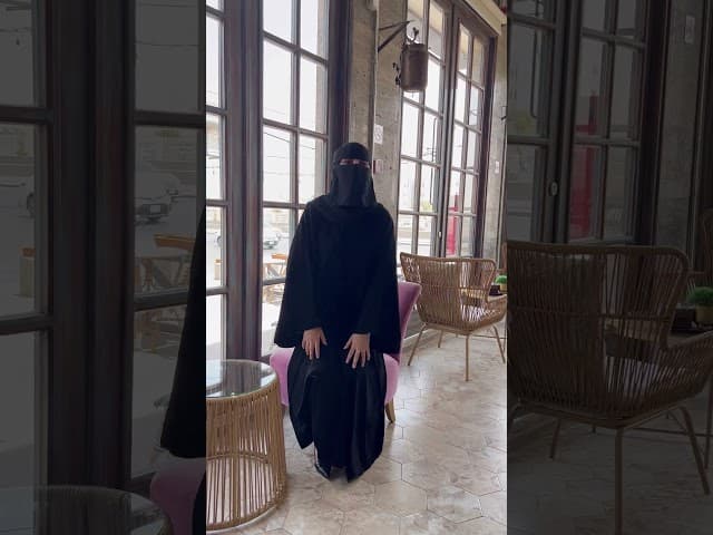 عباية بجيوب عملية وفضفاضة
